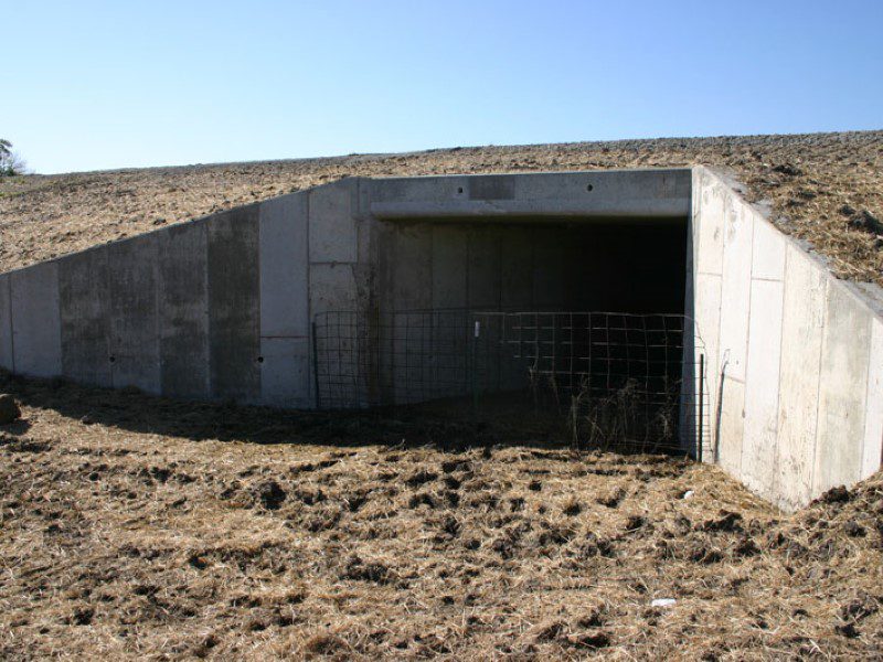 A concrete structure in the middle of nowhere.